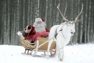 A man dressed as Santa Claus rides his sleigh as he prepares for Christmas on the Arctic Circle in Rovaniemi, northern Finland A man dressed as Santa Claus rides his sleigh as he prepares for Christmas on the Arctic Circle in Rovaniemi, northern Finland